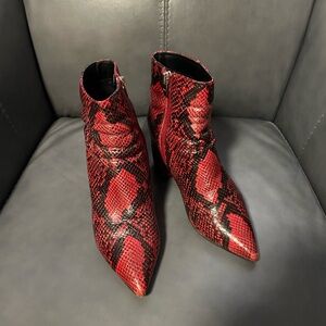 Marc Fisher red ankle boots with side zipper. Size 7. Some wear as shown in pic.